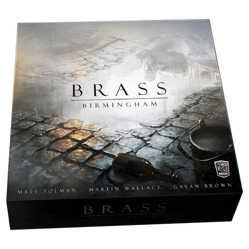 Front cover of Brass Birmingham board game box featuring moody cobblestone street artwork with designers Matt Tolman, Martin Wallace, and Gavan Brown credited.