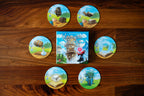 Wandering Towers Spell Pack box surrounded by six large circular spell tiles featuring magical artwork on a wooden surface.