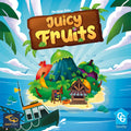 Juicy Fruits board game box front, showing a colorful tropical island with oversized fruits, a volcano, market stall, and arriving boat.