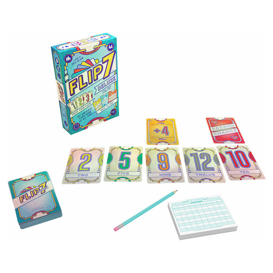 Flip 7 Deluxe card game components including number cards, action cards, a card deck, pencil, and scorepad displayed next to the game box.