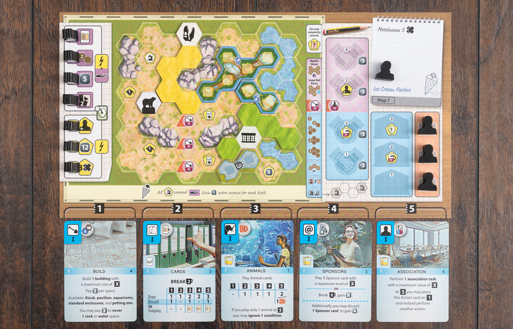 Ark Nova Marine Worlds game spread showing hexagonal zoo map board, player scorepad, and five action cards including Build, Cards, Animals, Sponsors, and Association.
