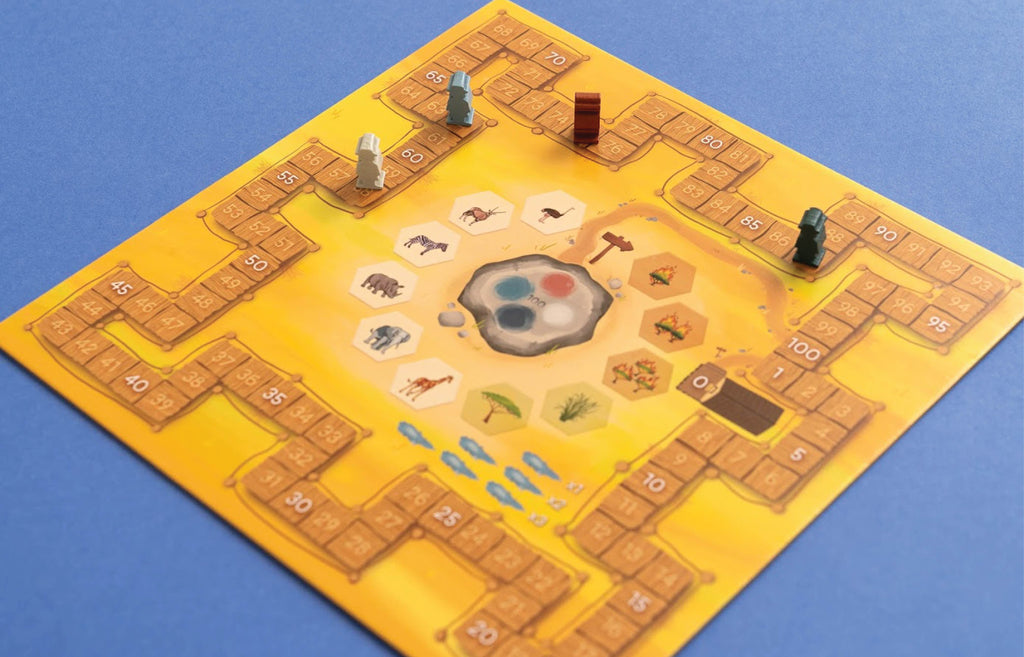 Savannah Park game board with numbered scoring track, central animal hexagon tiles, and four colored wooden meeples positioned around the safari-themed board.